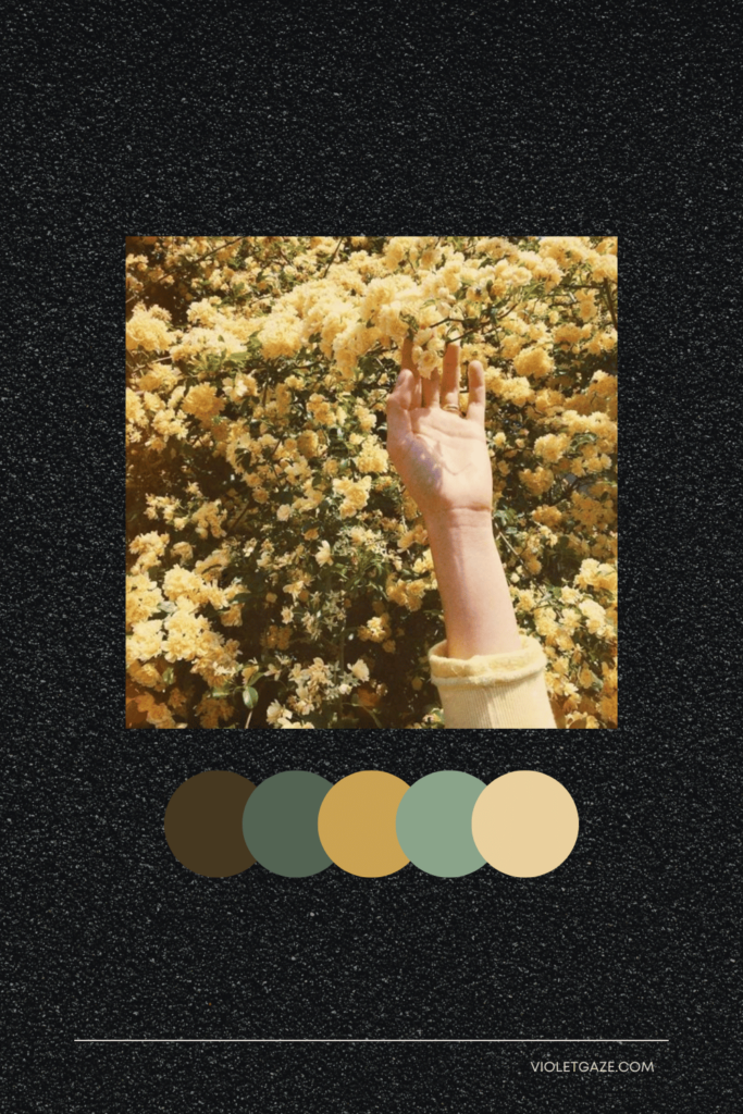 cottagecore color palette hand reaching for yellow flowers