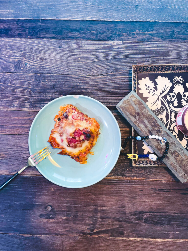 plant-based lasagna on wooden table