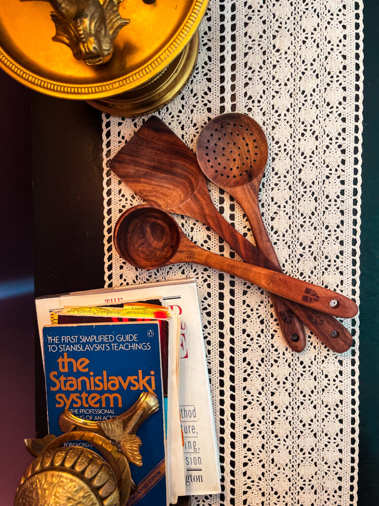 wooden spoons with books