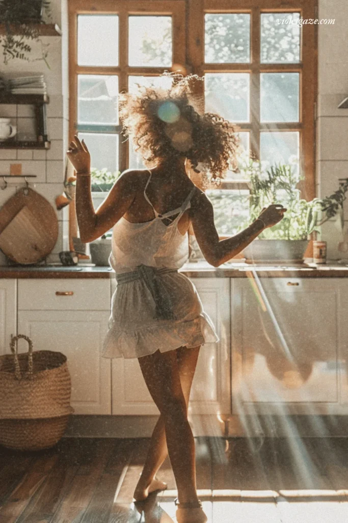 image of a woman dancing in her kitchen